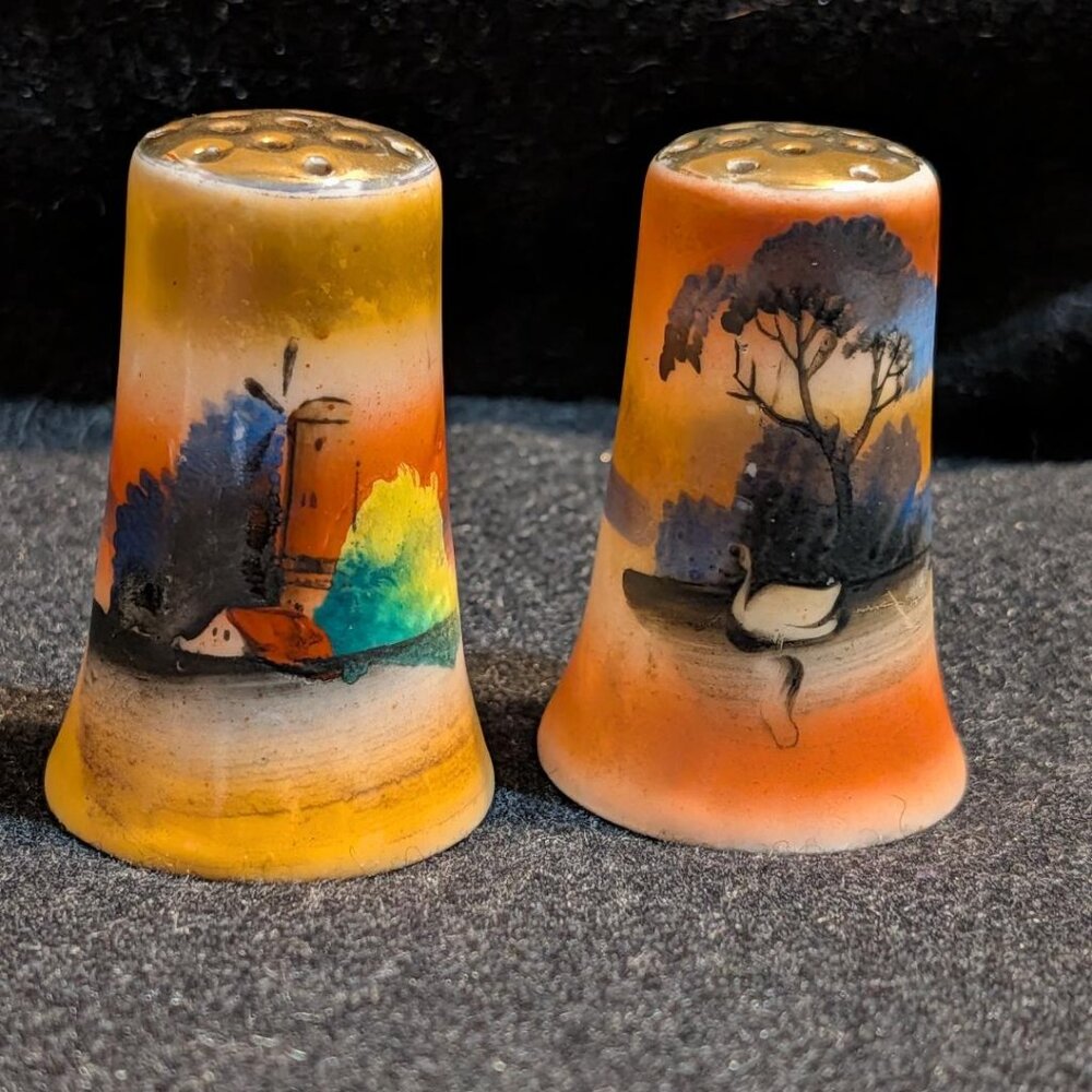 Hand-painted ceramic salt and pepper shakers with landscape scenes from Japan